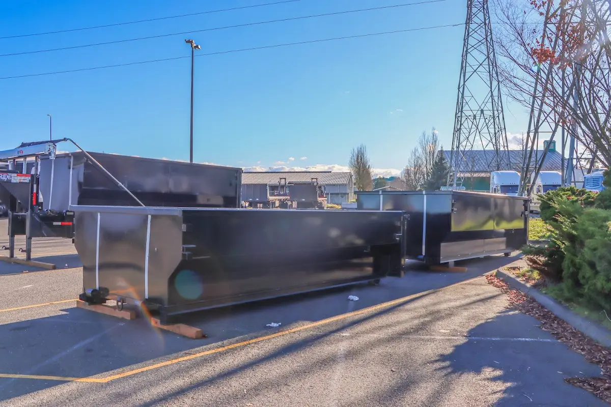 Roll-off dumpster ready for waste disposal at job site for Construction Dumpster Rental in Glen Cove